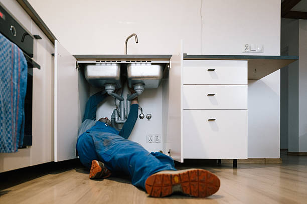Professional Drain Cleaning technician working in Robertsville, NJ